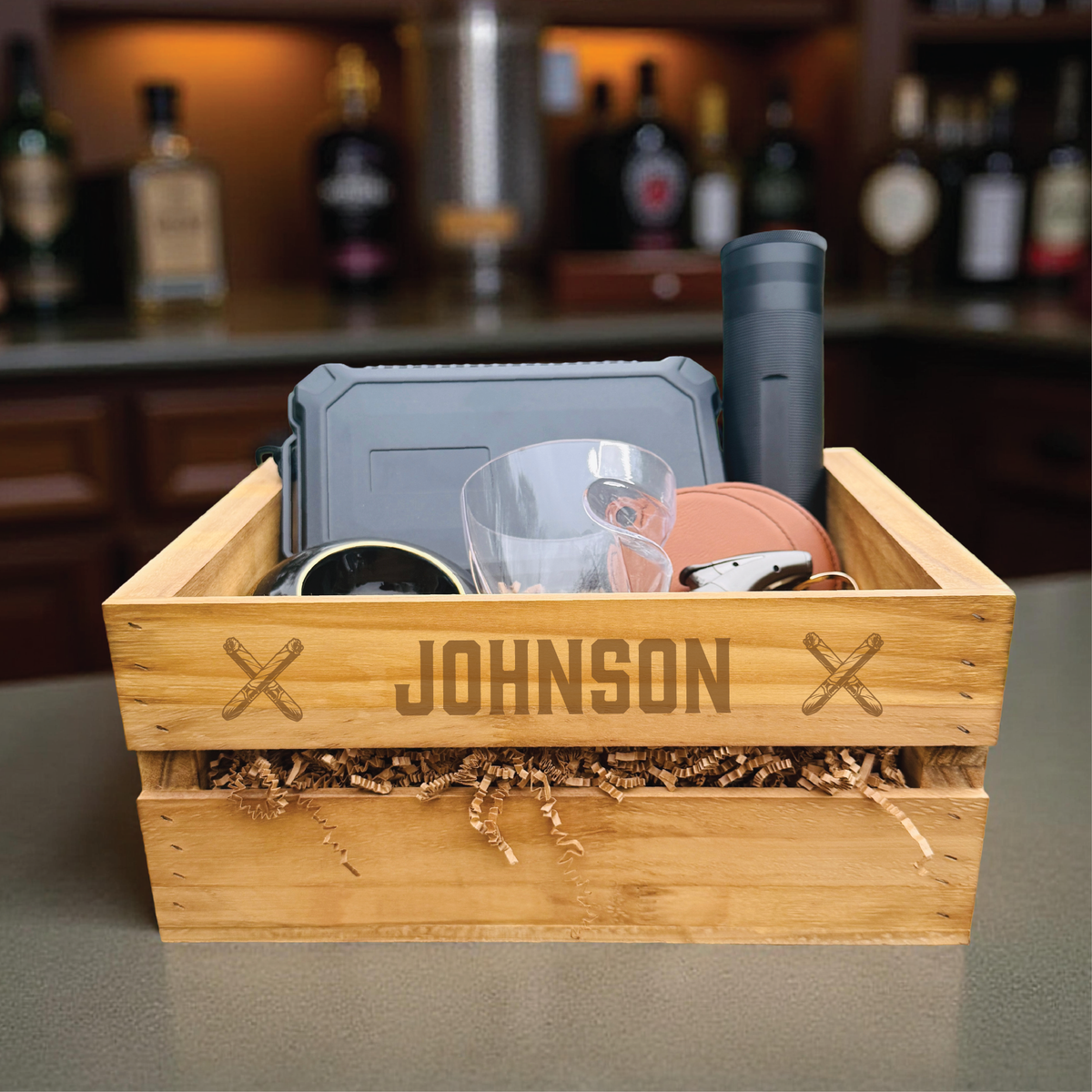 Ultimate personalized cigar gift set with engraved wooden crate, whiskey glass with cigar holder, and humidor for groomsmen.