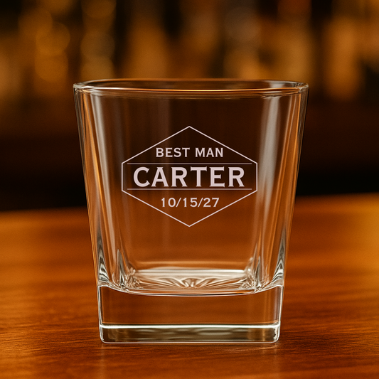 Engraved whiskey glass with groomsman name and wedding date on bar